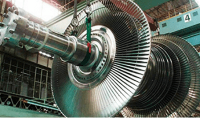 Mitigating corrosion in steam turbine engines with engineered compression